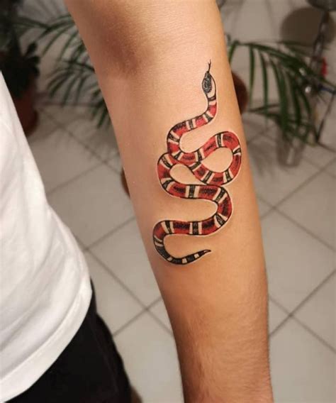 gucci snake tatoo